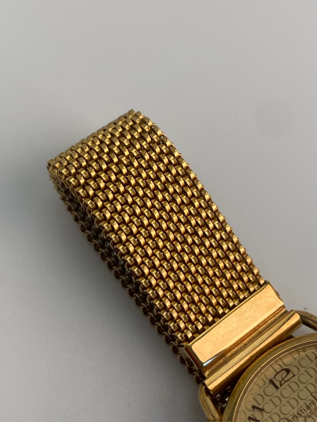 Dior 59 121 logo dial gold watch