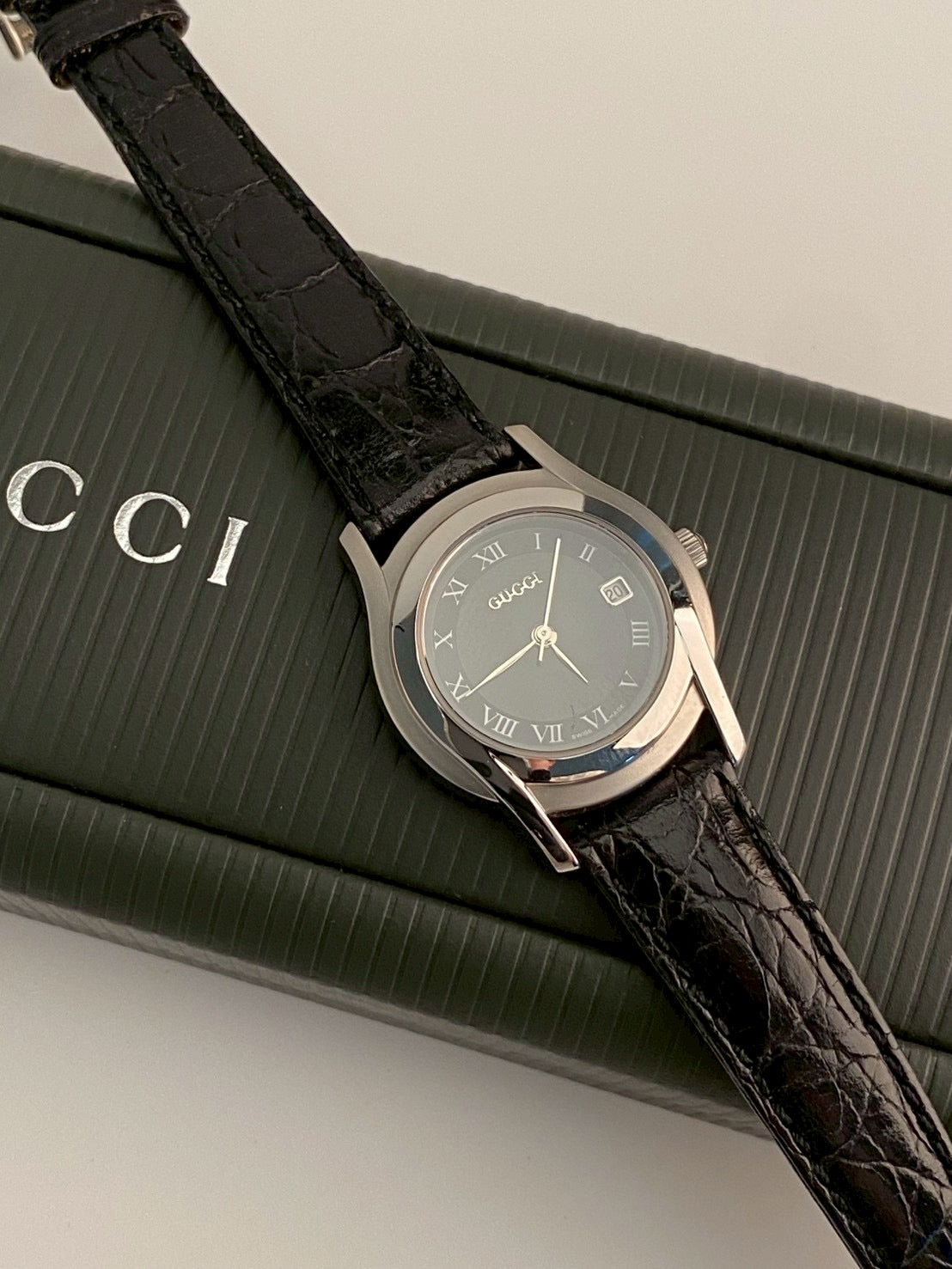 Gucci 5500l black dial watch
