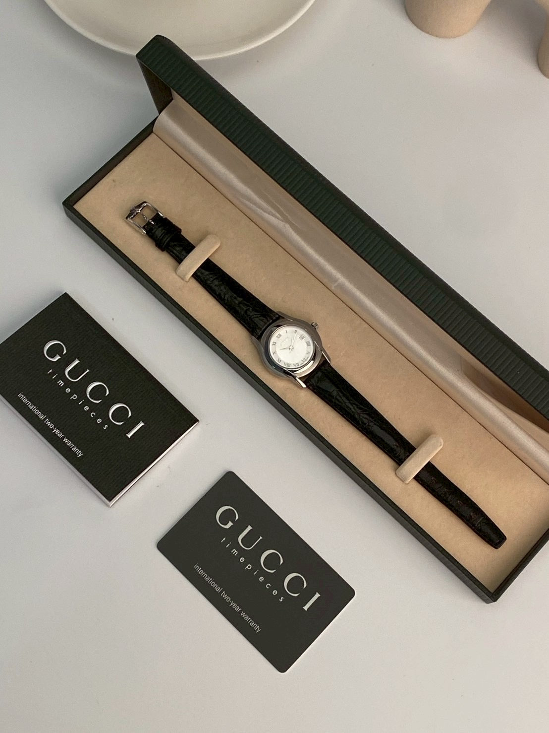 Gucci 5500l silver dial watch