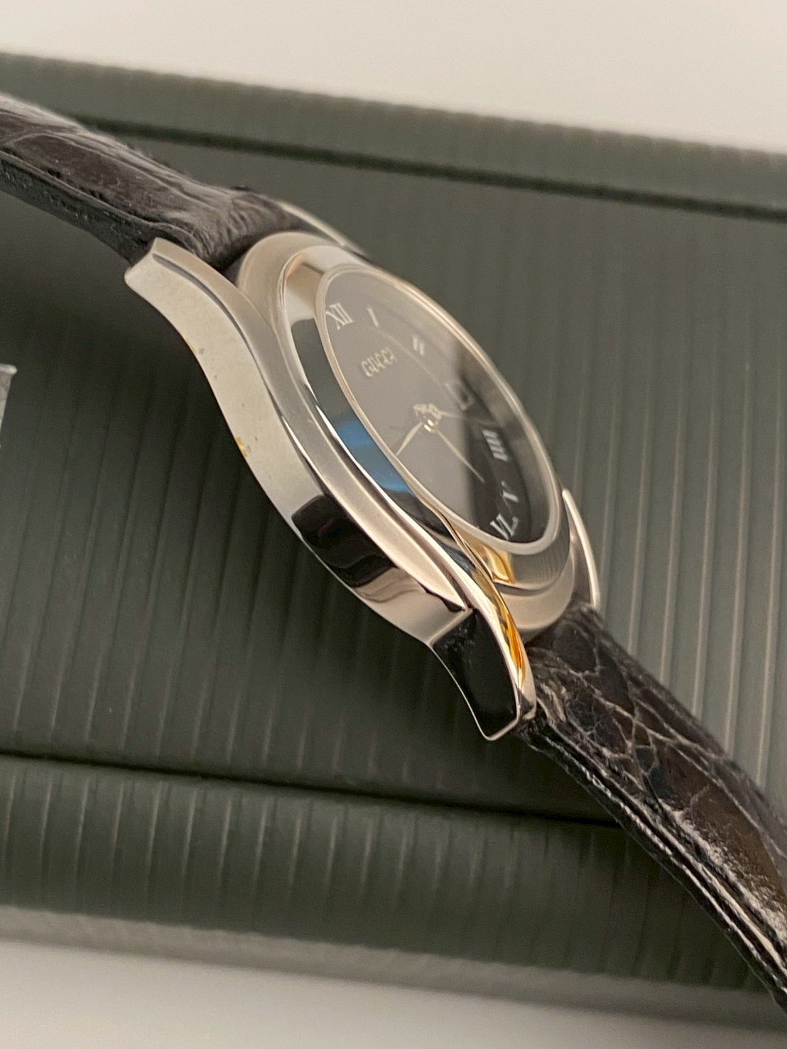 Gucci 5500l black dial watch