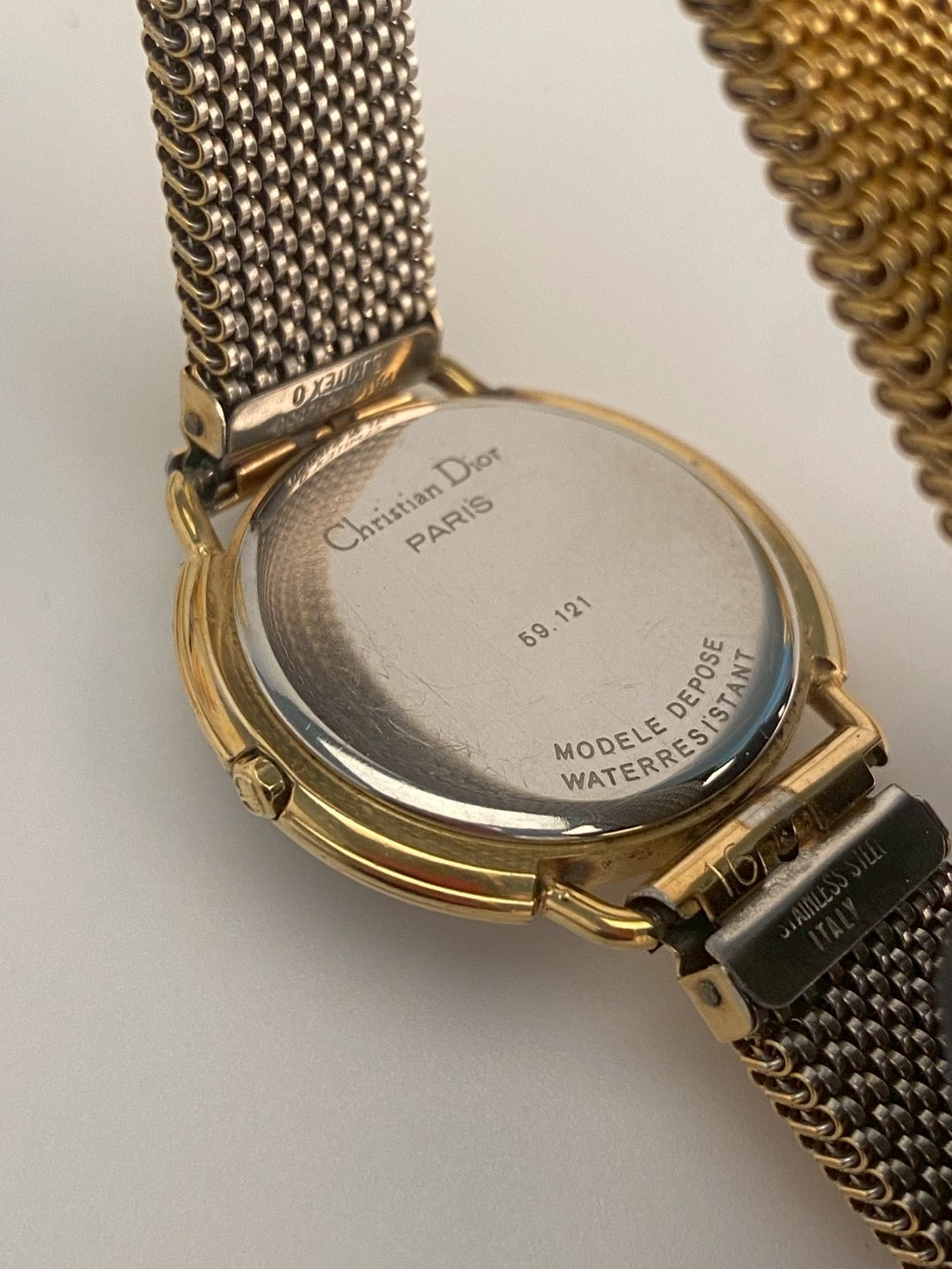 Dior 59 121 logo dial gold watch