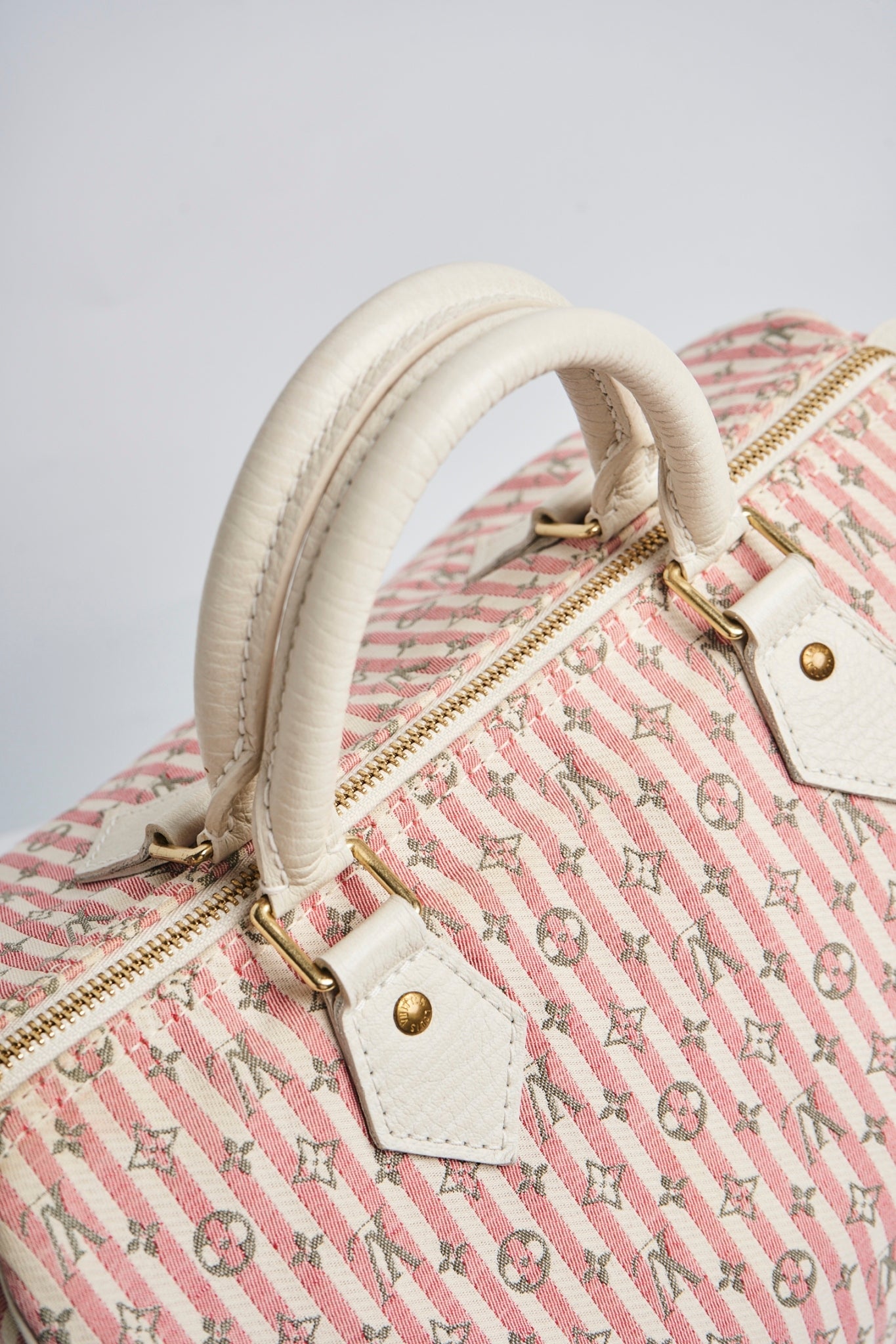 Louis Vuitton pink mini lin speedy 30”