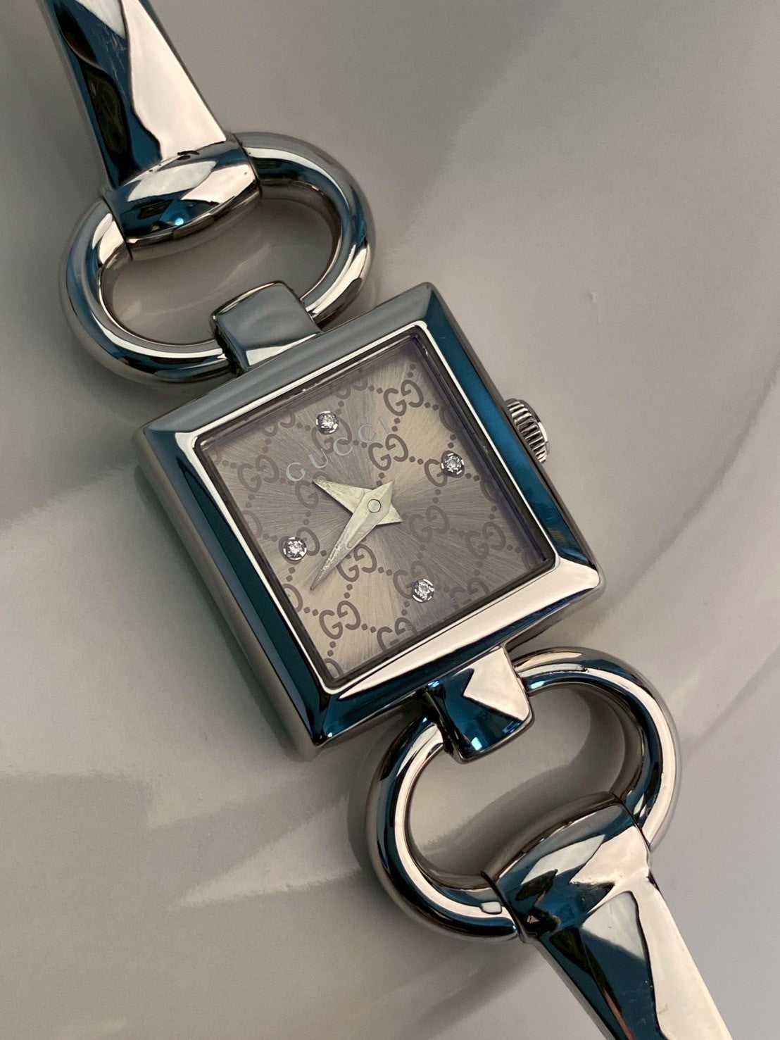 Gucci diamond logo dial