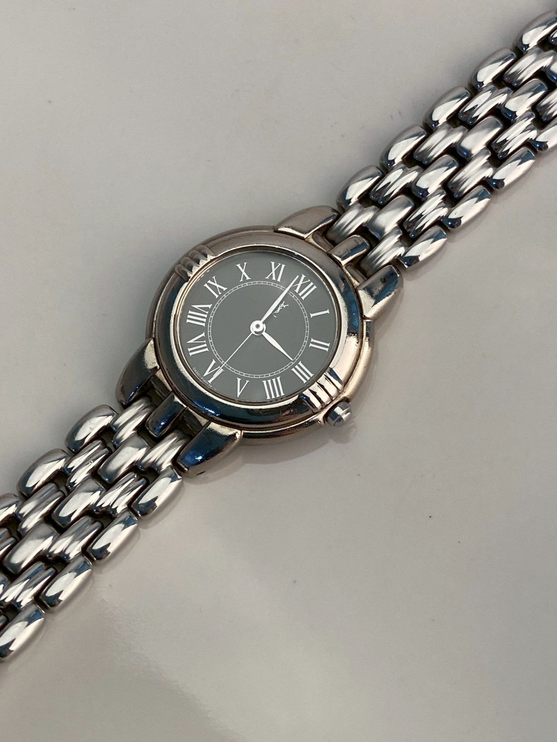 Ysl black dial silver watch