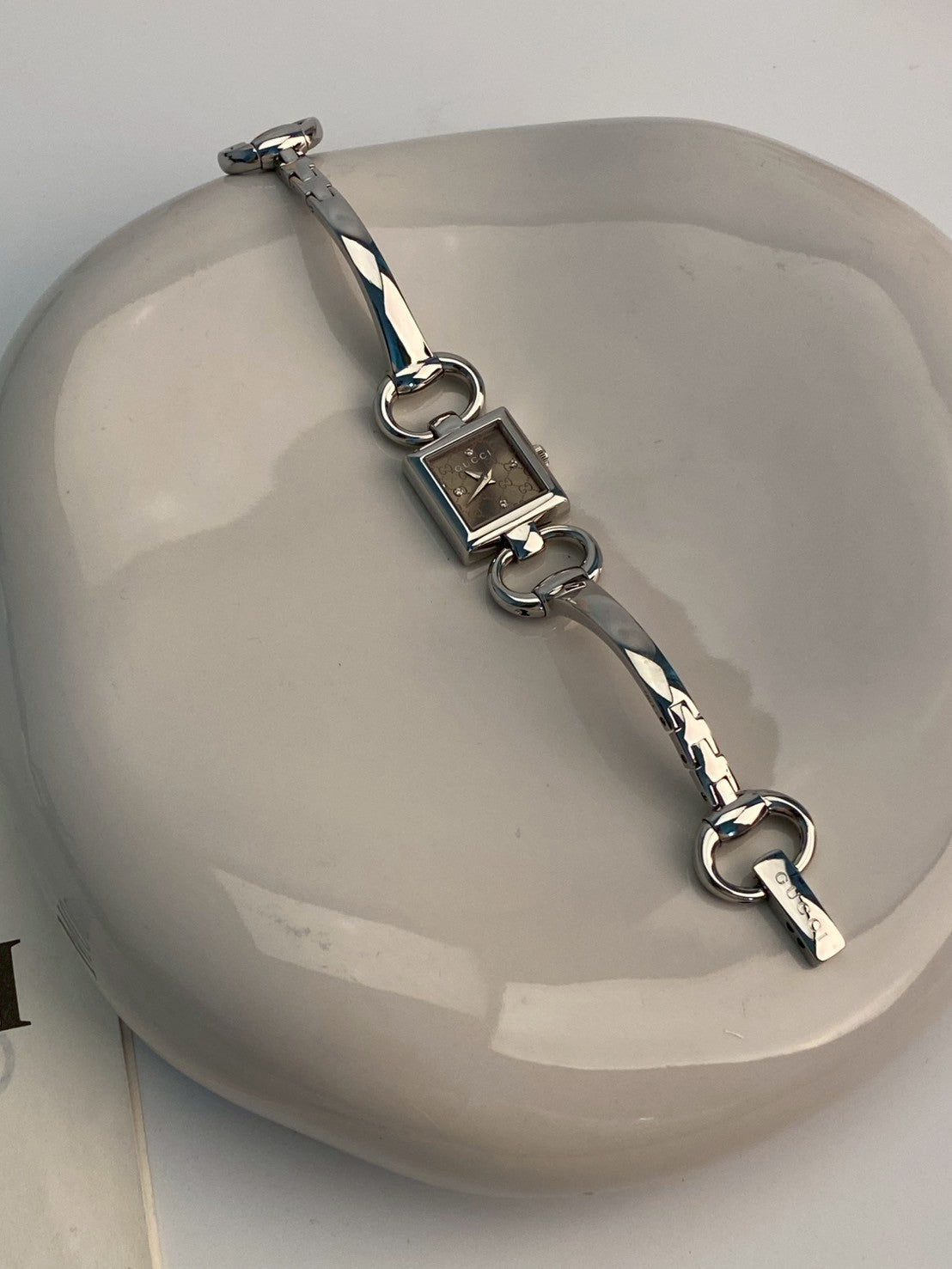 Gucci diamond logo dial