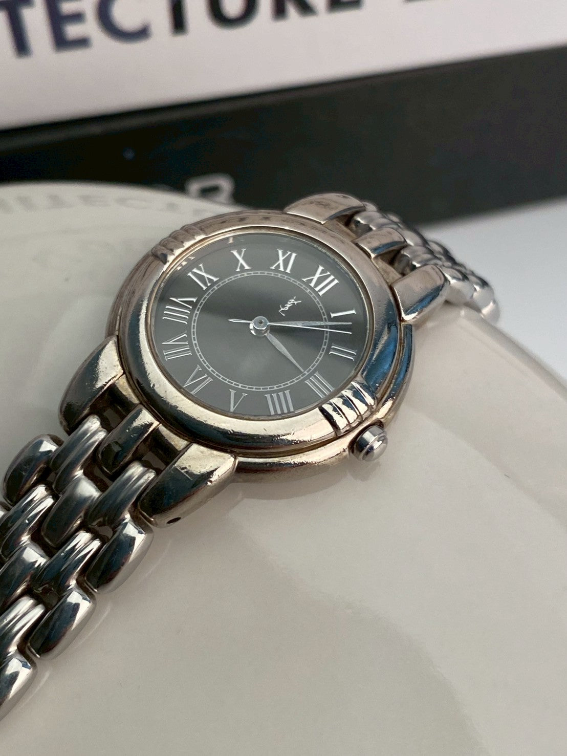 Ysl black dial silver watch