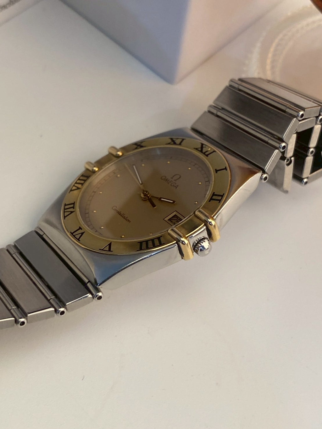 Omega constellation twotone date gold dial