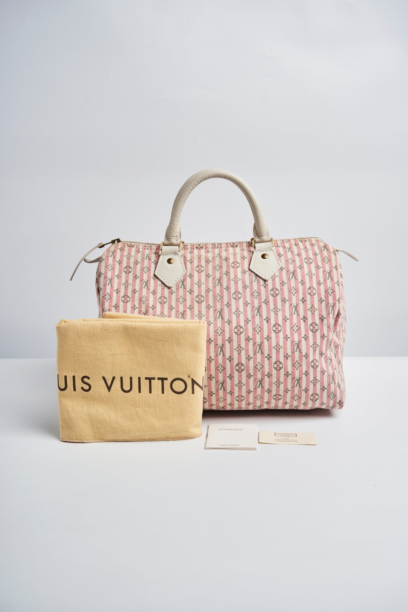 Louis Vuitton pink mini lin speedy 30”
