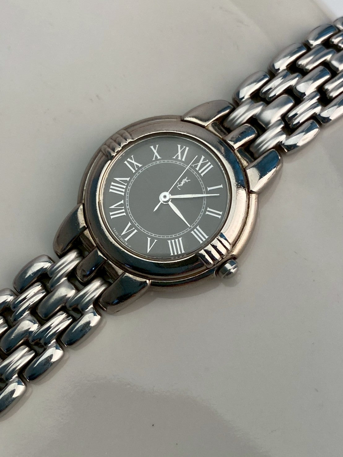 Ysl black dial silver watch