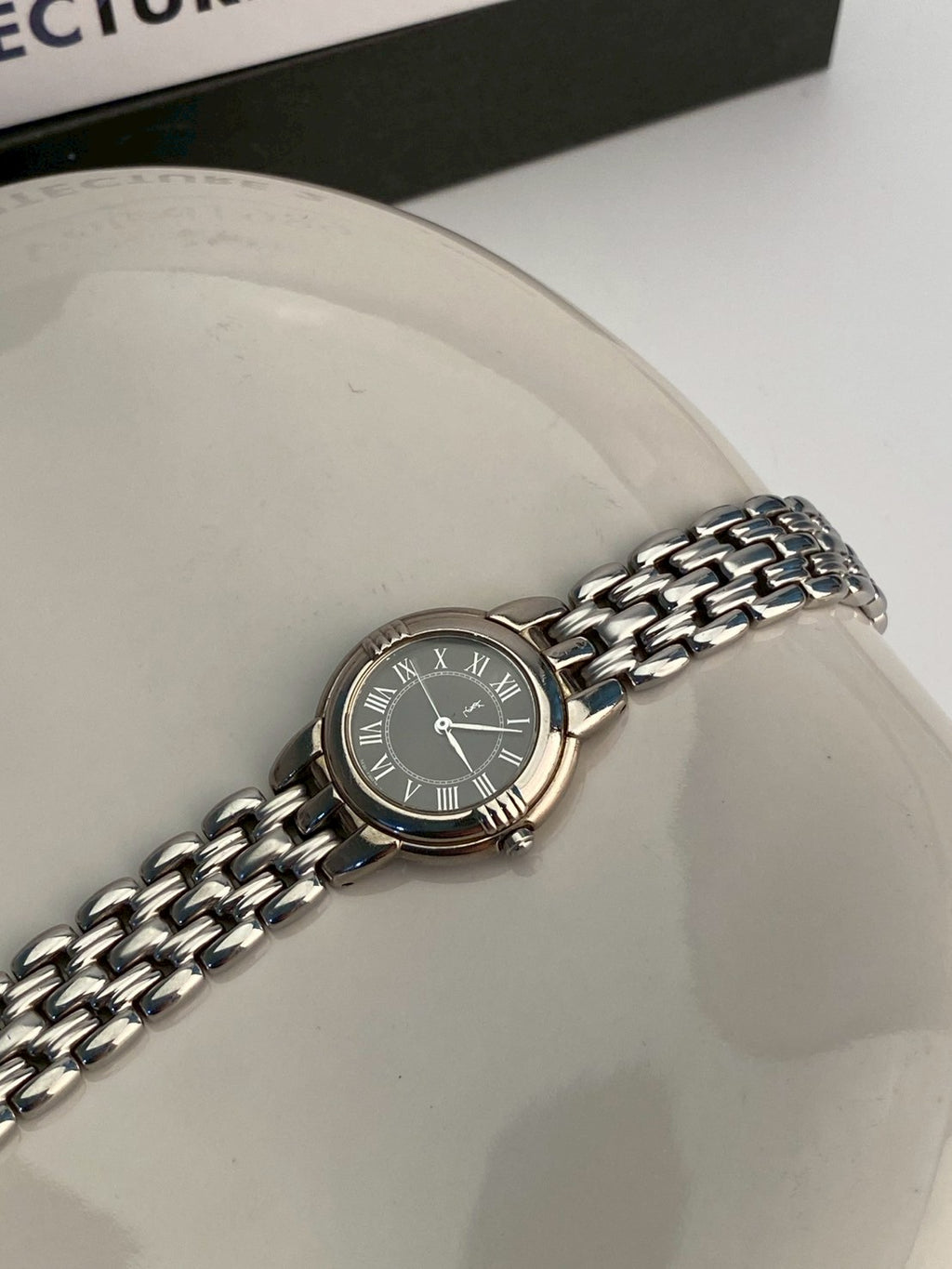 Ysl black dial silver watch