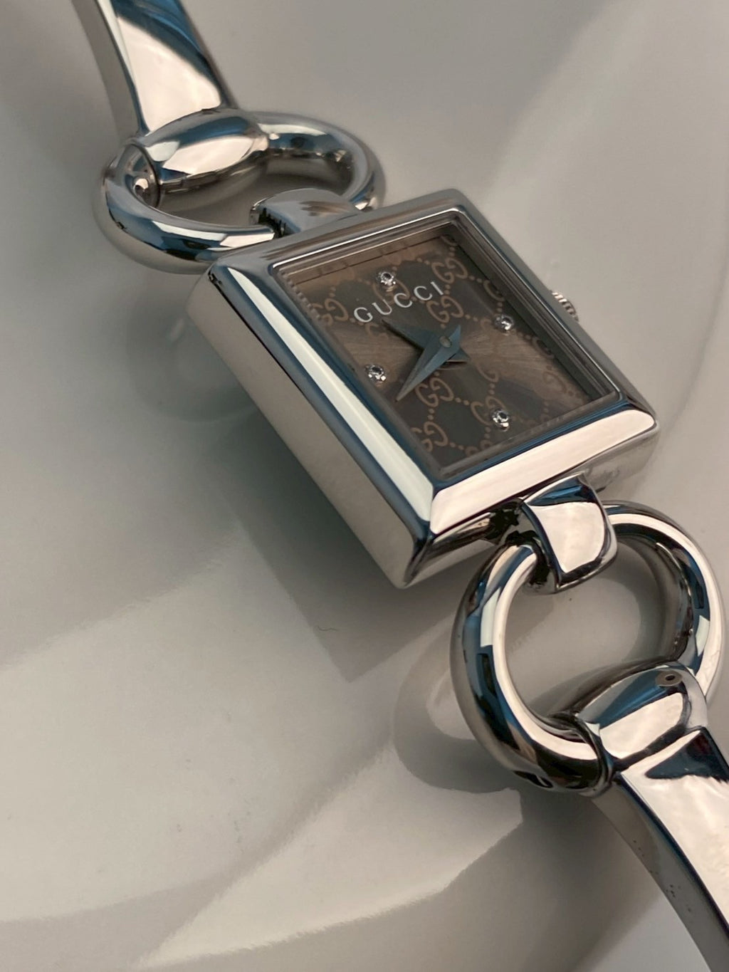 Gucci diamond logo dial
