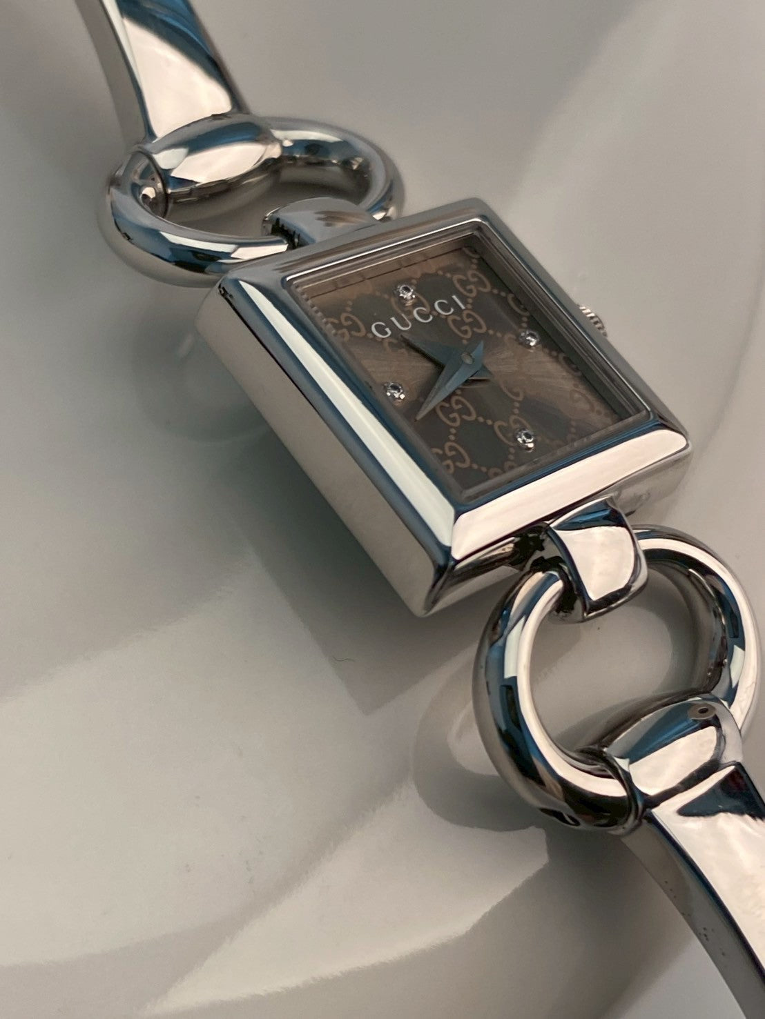 Gucci diamond logo dial