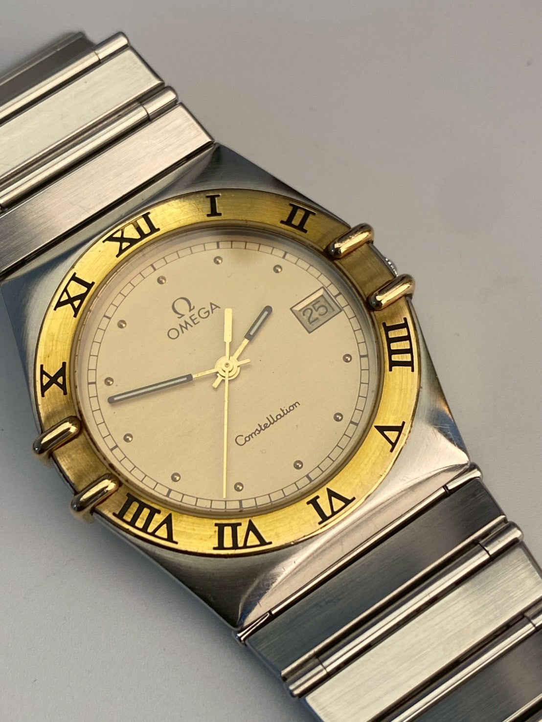 Omega constellation twotone date gold dial