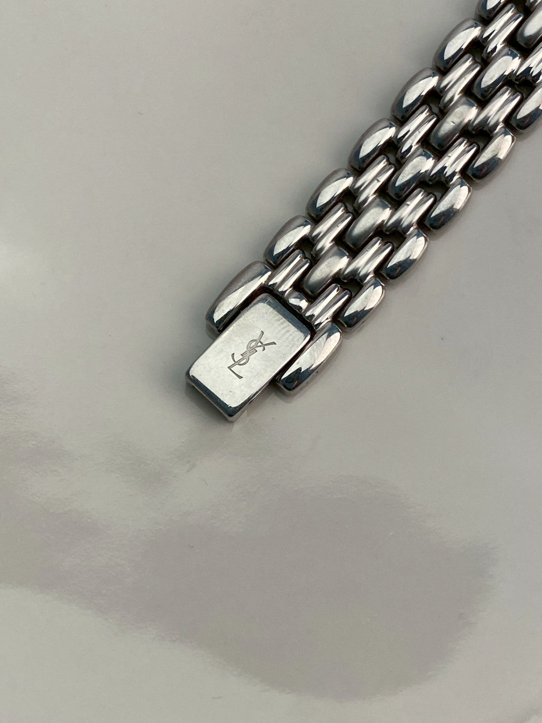 Ysl black dial silver watch