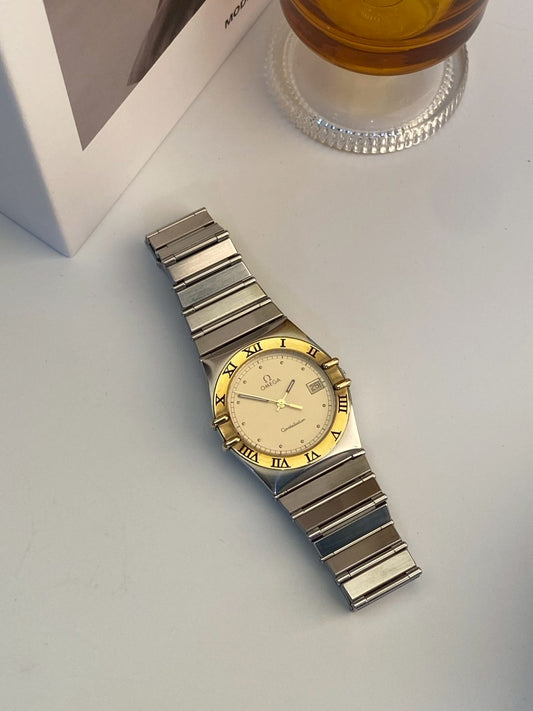 Omega constellation twotone date gold dial