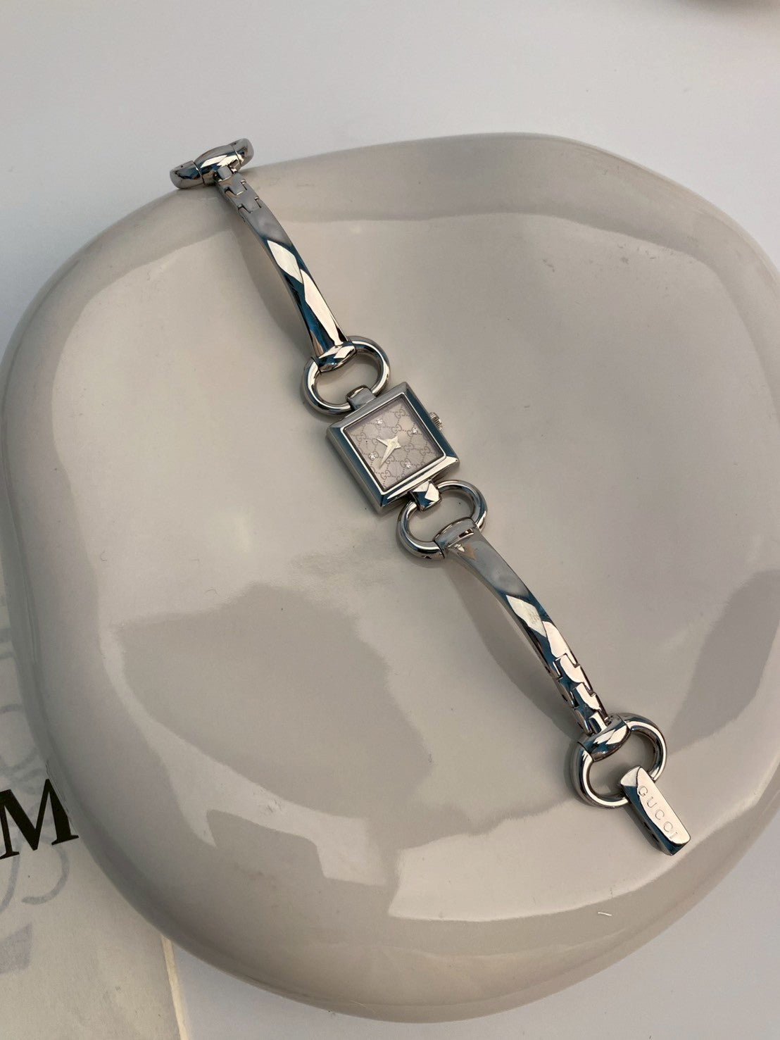 Gucci diamond logo dial