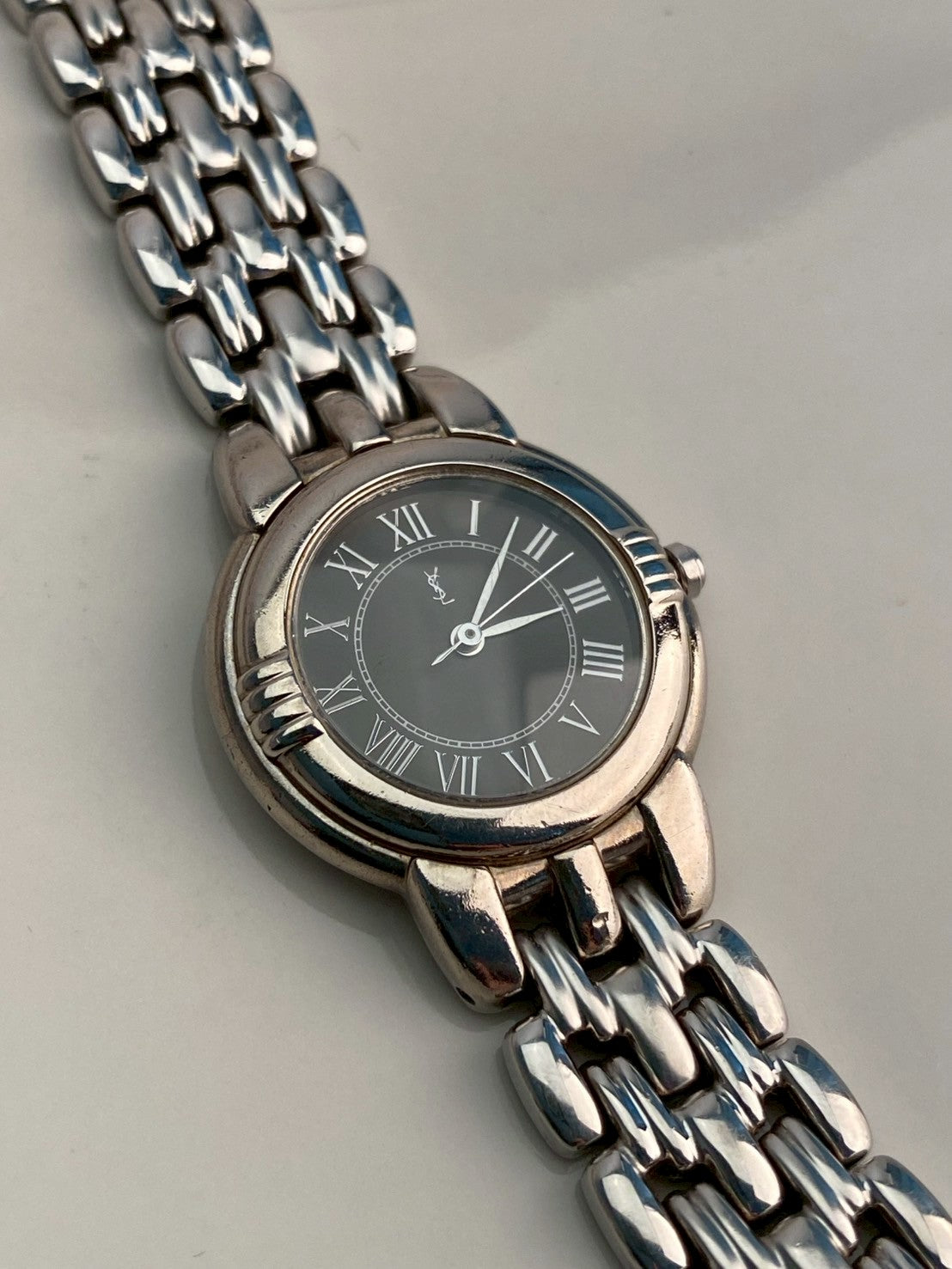 Ysl black dial silver watch