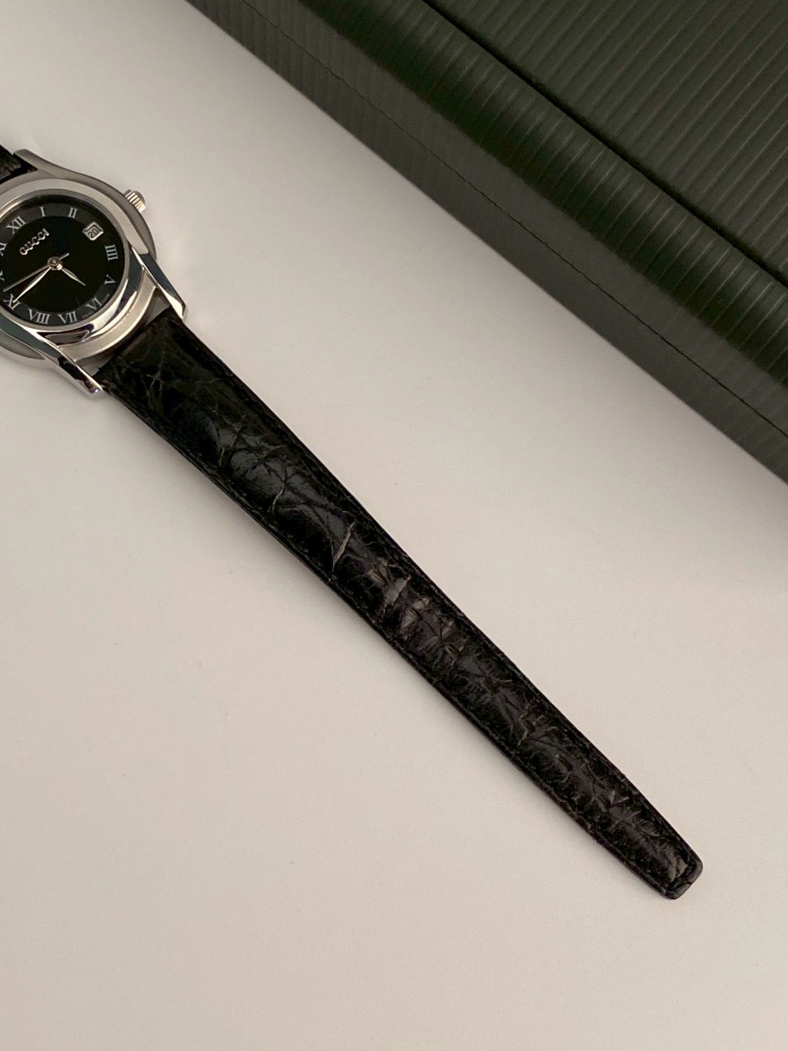 Gucci 5500l black dial watch
