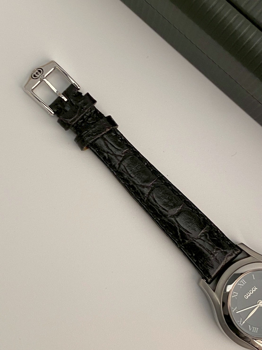 Gucci 5500l black dial watch