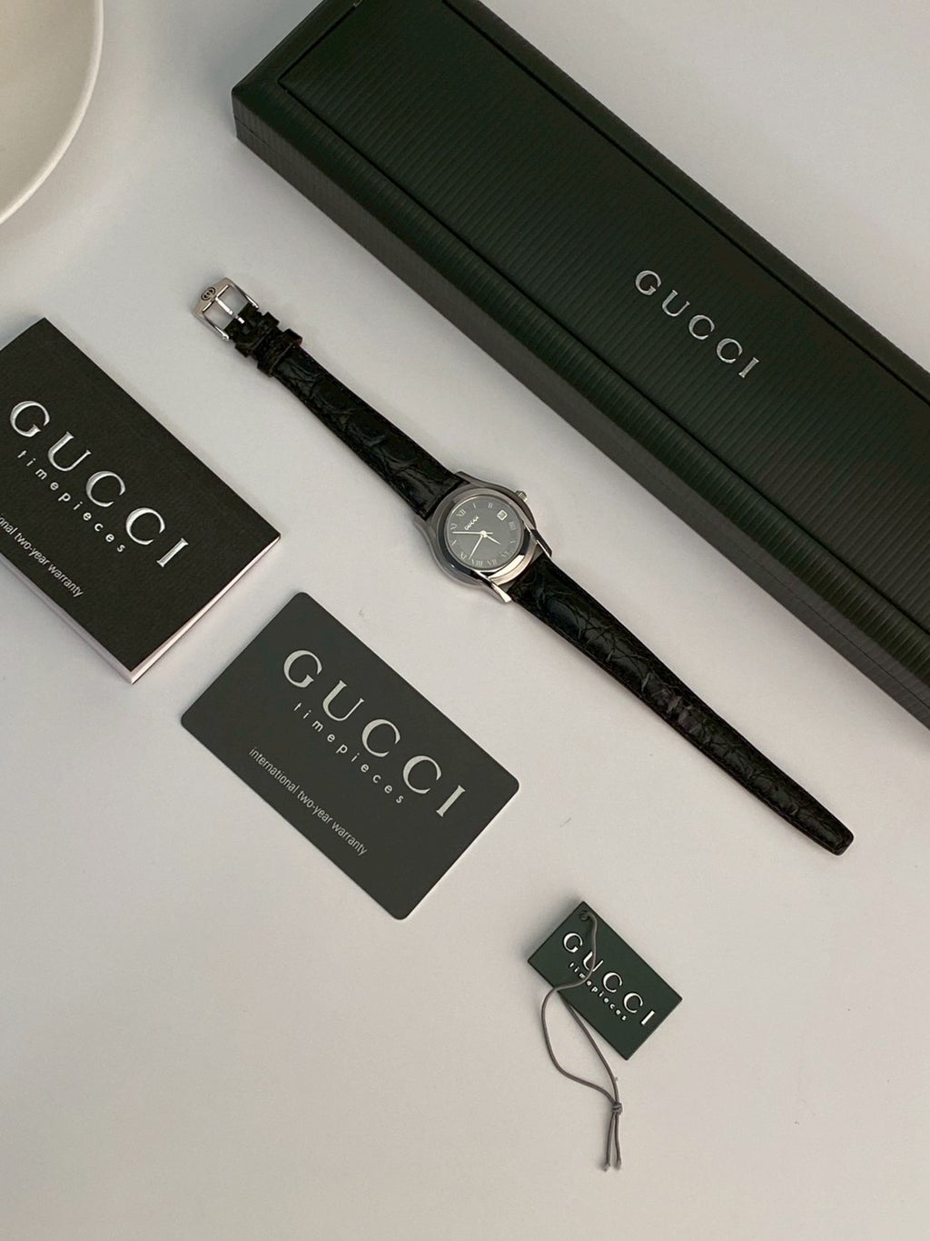 Gucci 5500l black dial watch