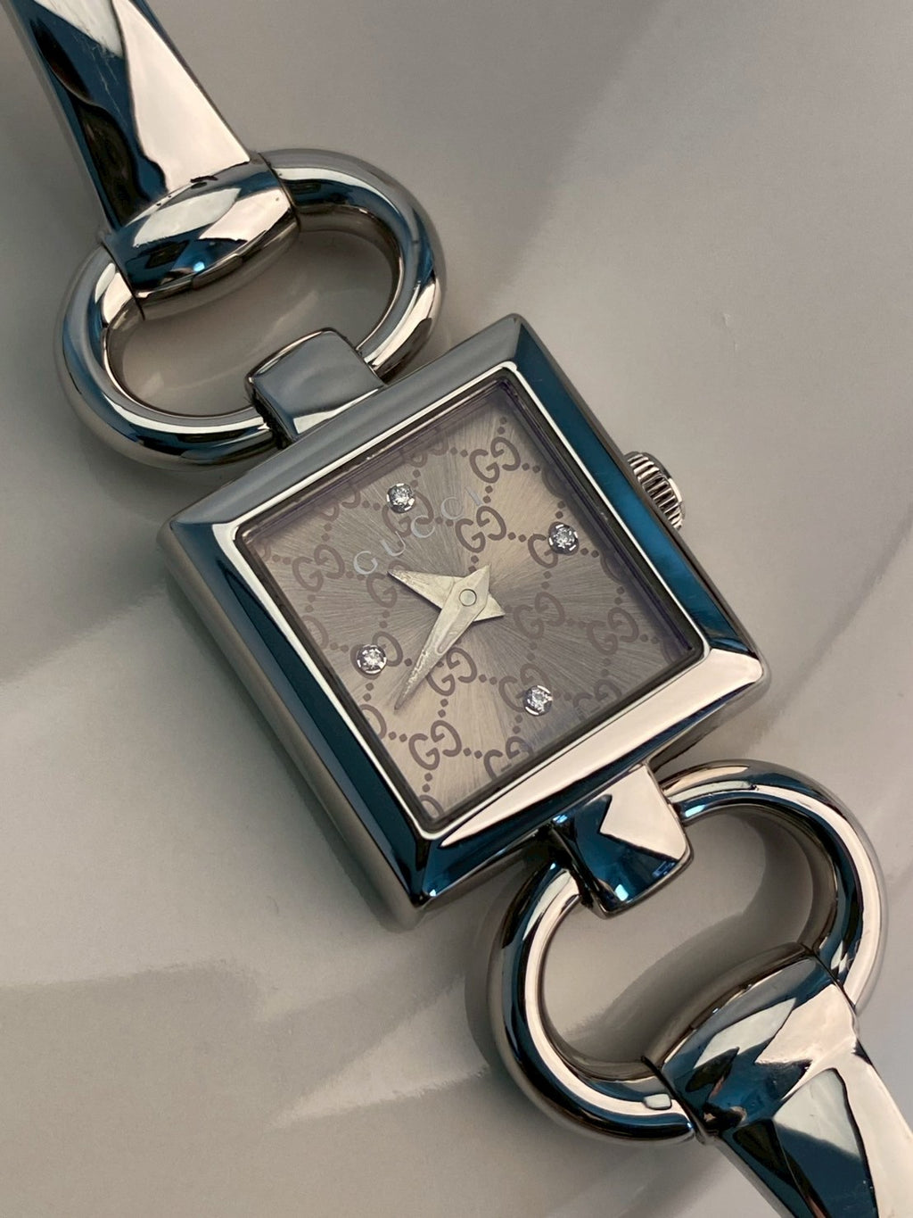 Gucci diamond logo dial