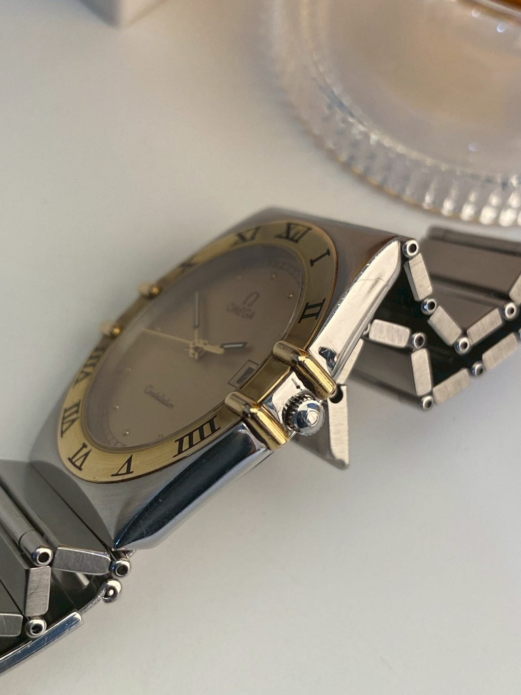 Omega constellation twotone date gold dial